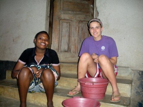 Removing rocks from buckets of beans in Tanzania.